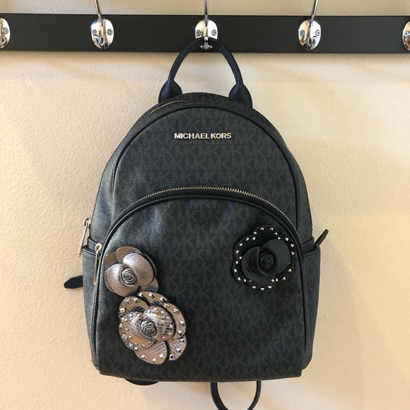 Michael Kors Handbags - EUC Michael Kors Abbey Medium Backpack in Signature Black/Grey with Flowers